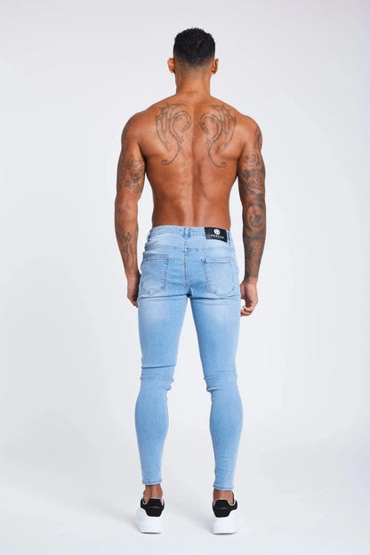 Ilay | The Signature Four-Way Stretch Ripped Jeans